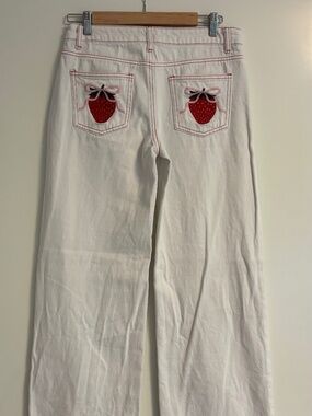 Edikted white jeans with strawberries (size women’s small)